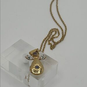 Vintage gold tone angel pendant locket birthstone necklace - purple rhinestone